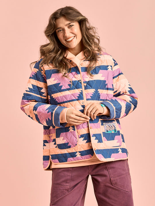 This unisex jacket is quilted for extra warmth, this piece brings both comfort and standout style.