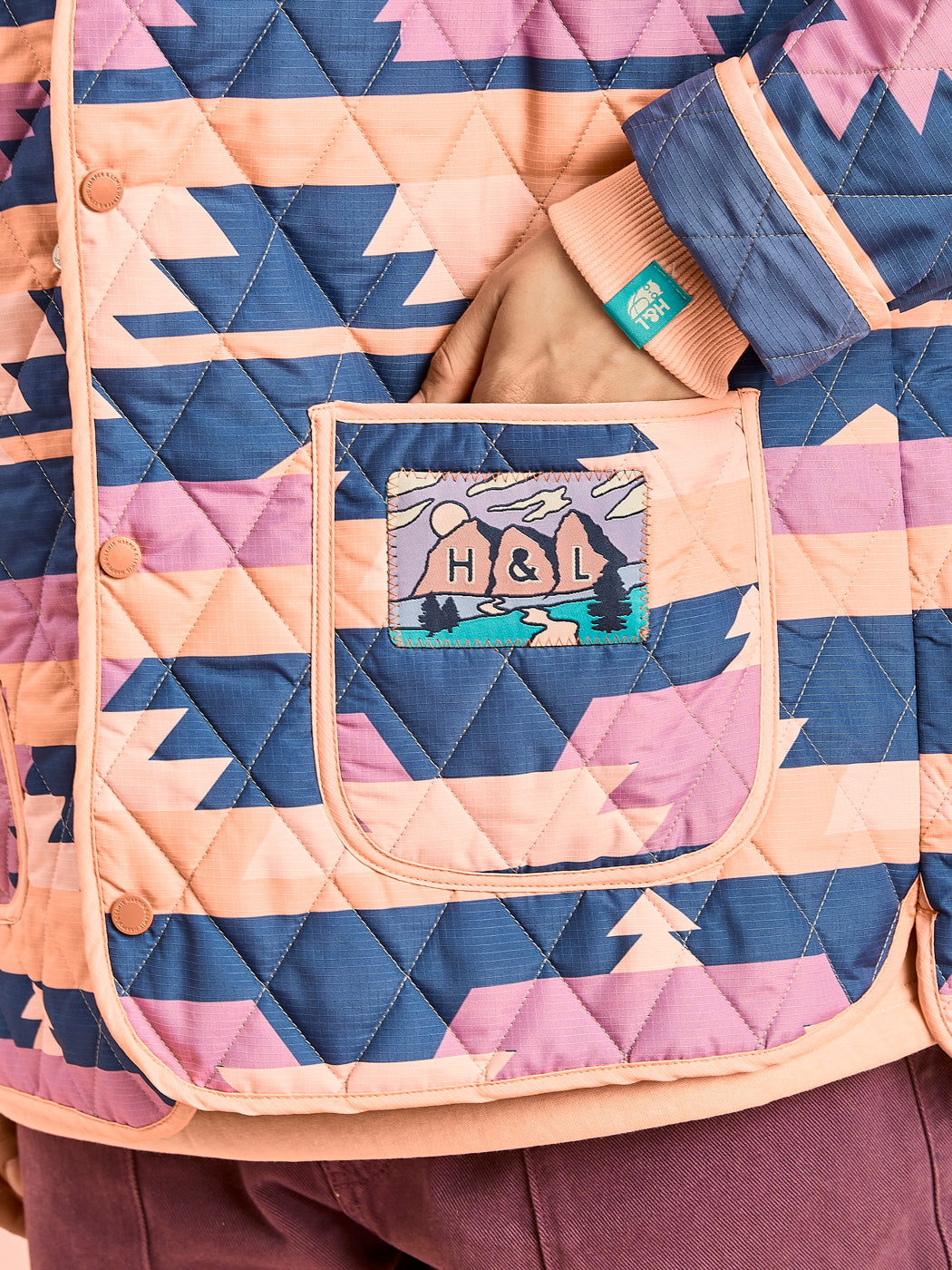 Detailed with a Harper & Lewis woven badge on the pocket and finished with popper buttons and front pockets.
