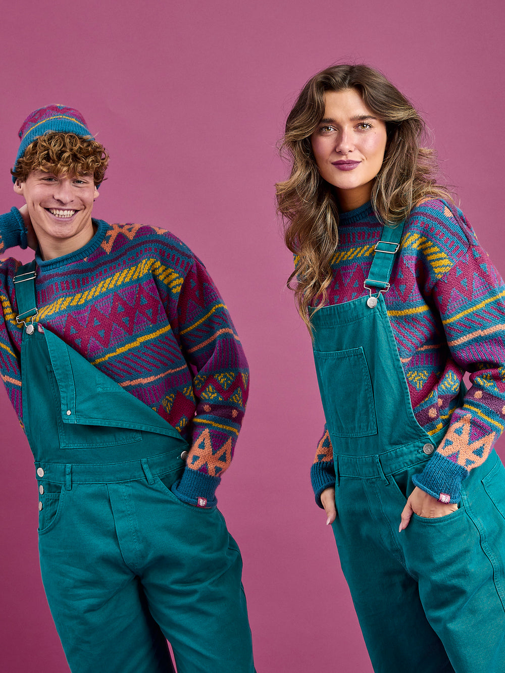 Both models wearing the Aria, workwear style dungarees, featuring two side pockets