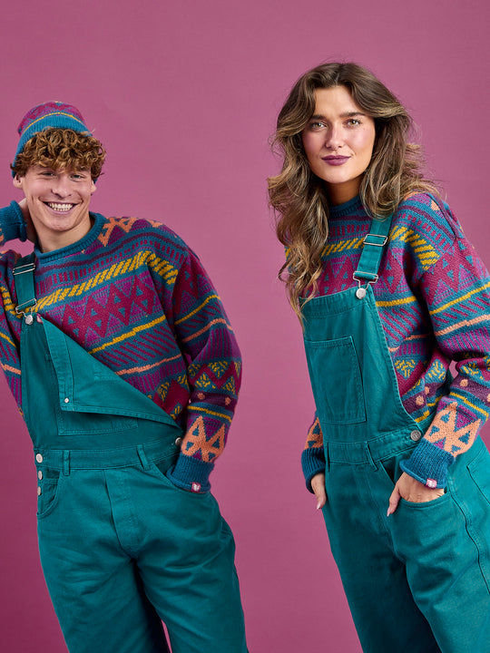 Both models wearing the Aria, workwear style dungarees, featuring two side pockets