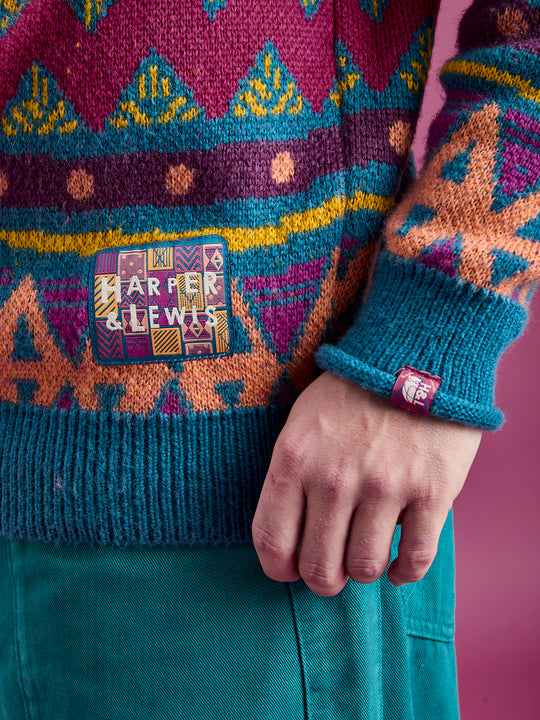 Detail shot of the branded patterned patch on the cuff and by the hem.
