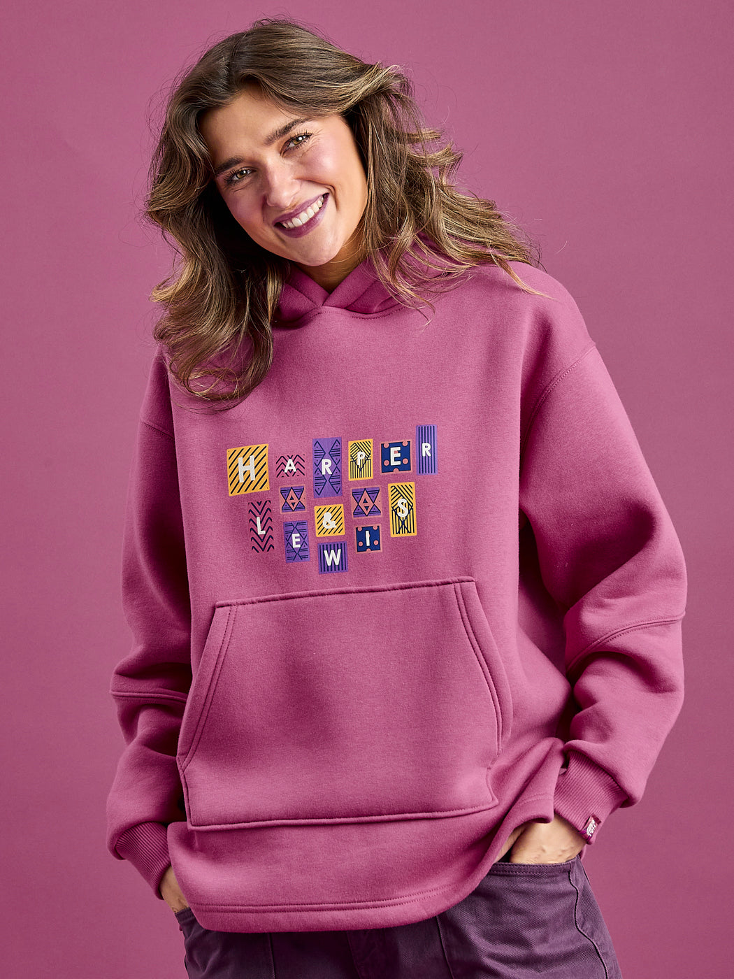This oversized women's hoodie features a released hem at the bottom.