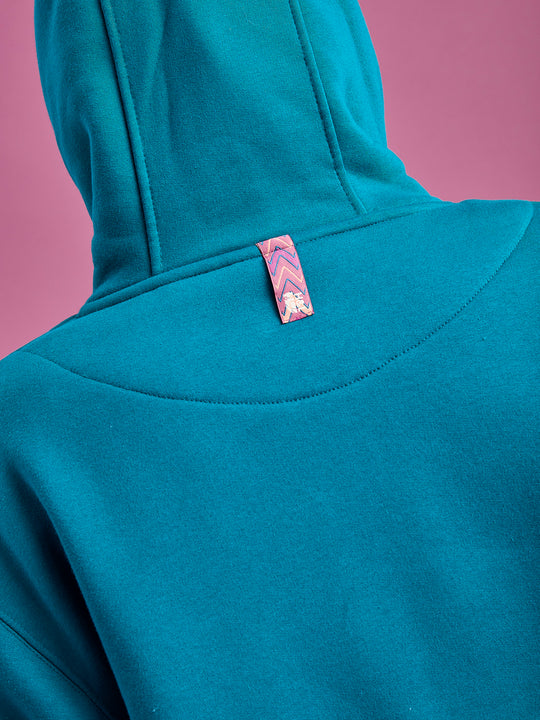 Detail shot of the back neck tab, in our signature print of the season.