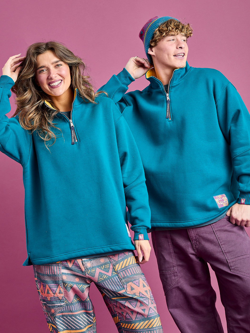 Both Models, showing how versatile it is to wear this Teal green sweatshirt. 