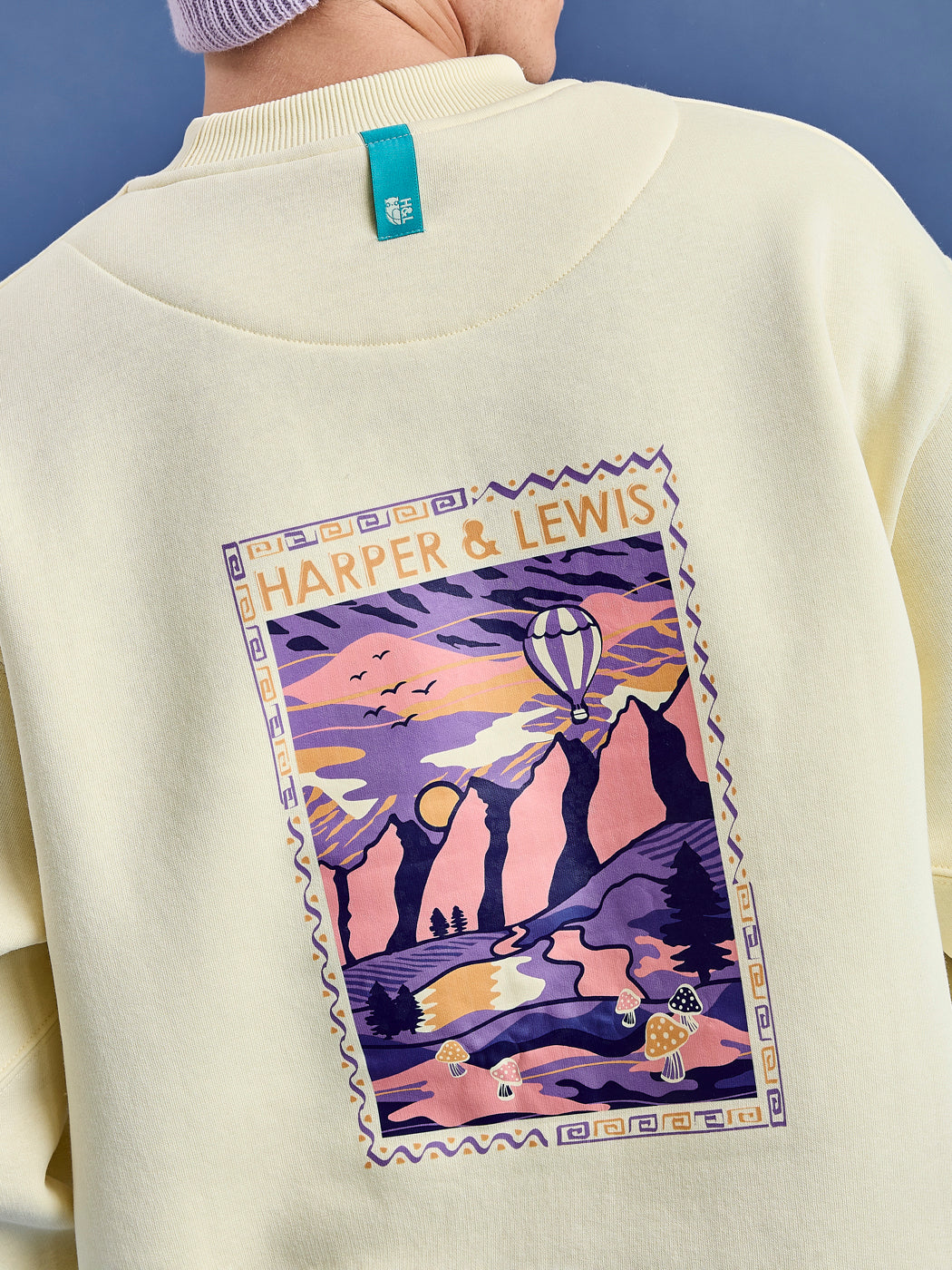 The Atlas sweater had a retro mountain inspired print on the back.
