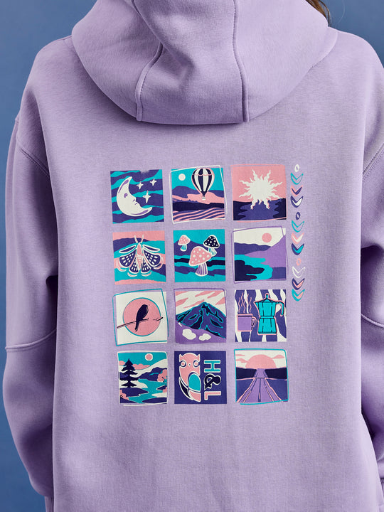 Detail shot of the retro inspired back graphic with colours of Purple, Teal, Peach, Cream and Navy.