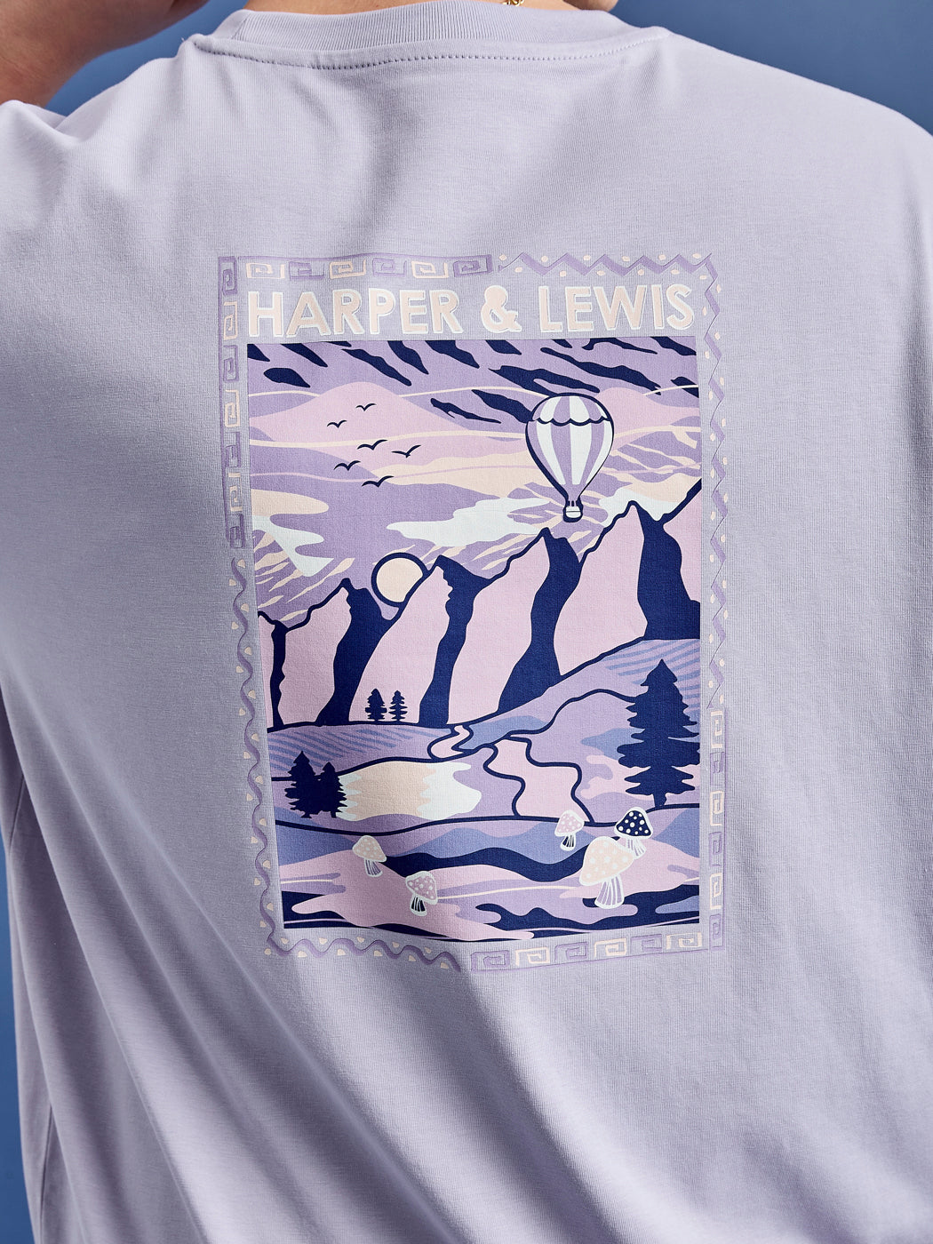 Detail shot of the back print which is inspired by retro mountain adventure