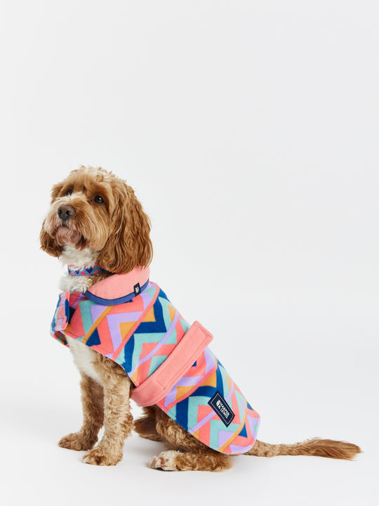 Keep your furry friend warm and stylish with the Raver Dogs Fleece.
