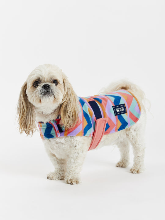 The colours of this print consist of Coral, Orange, Lilac, Sage and Airforce Blue, to make a retro patterned fleece.