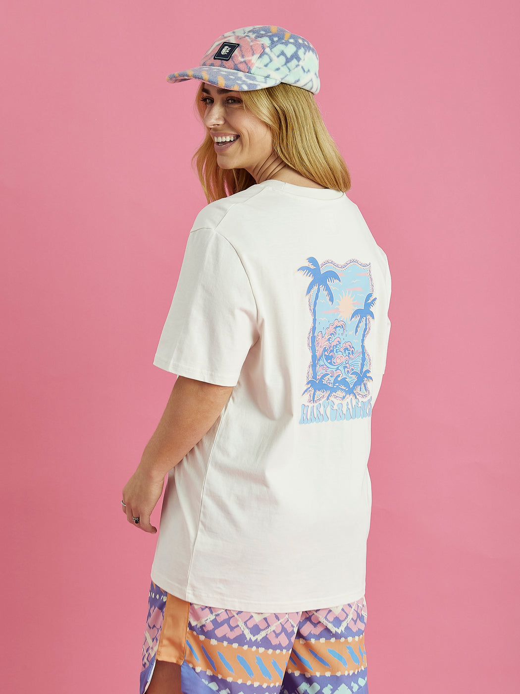 The colour of this Alwan tee is a cream colour similar to a beige.