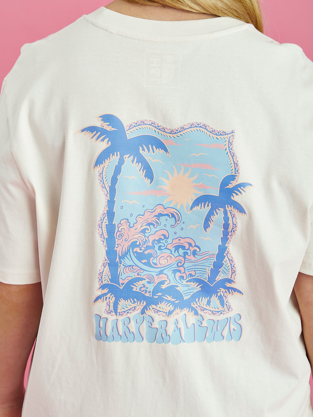 Detail shot of the back Tropical graphic on the Alwan tee in cream.