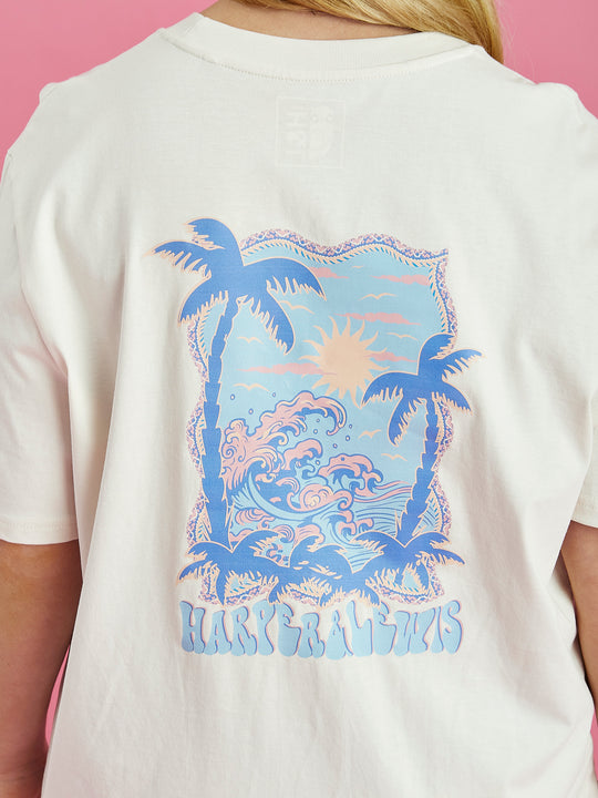 Detail shot of the back Tropical graphic on the Alwan tee in cream.