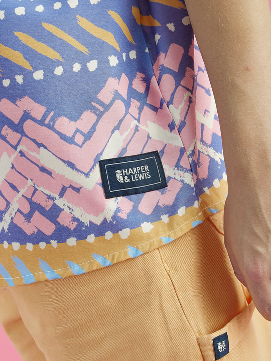 Detailed short of the Woven branded badge on the reef Shirt.