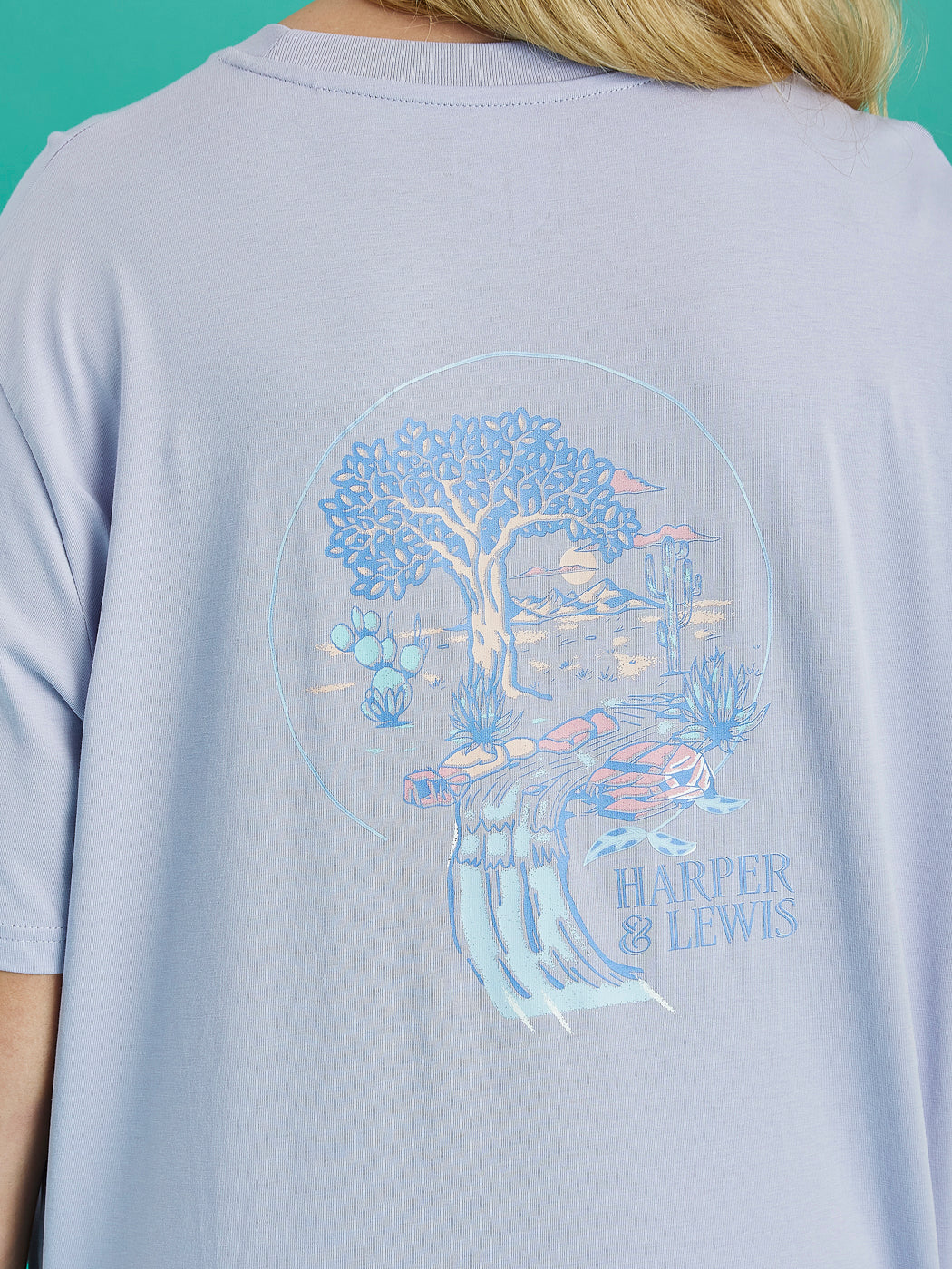 Back graphic of the Aura tee, showing colours of blue, peach and lavender.