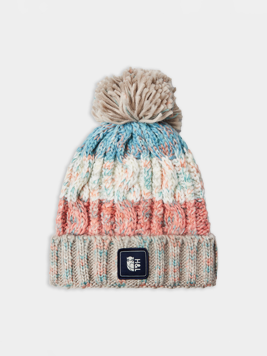 This heavyweight multi-yarn cable knit beanie is designed for both warmth and style.