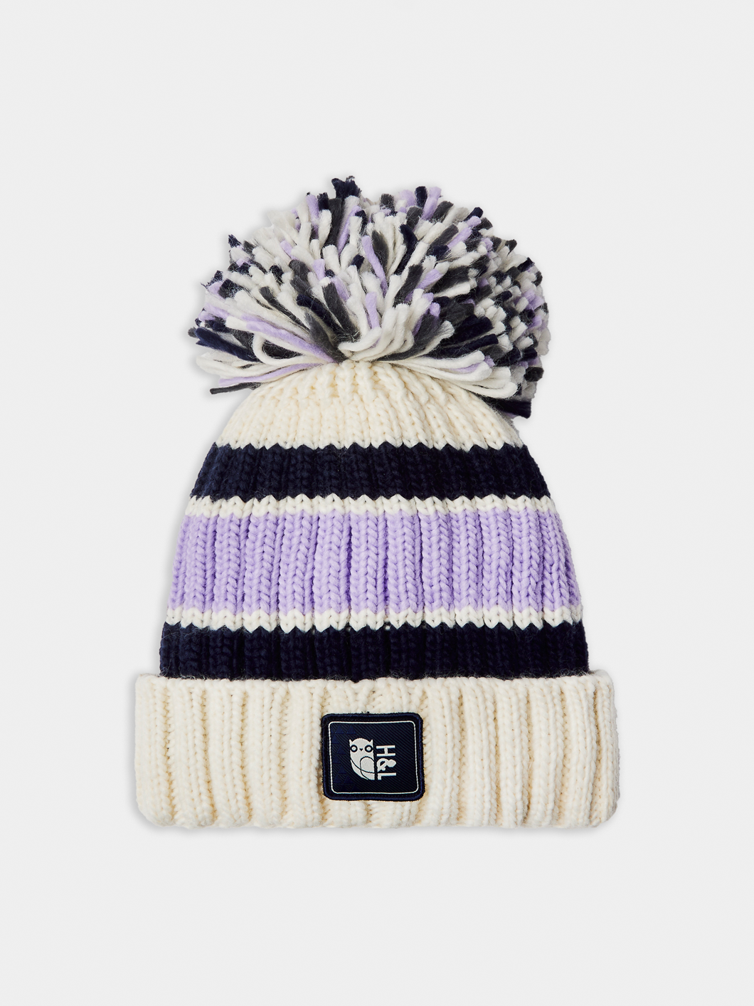 The winter beanie comes with a branded Woven Badge in Navy.
