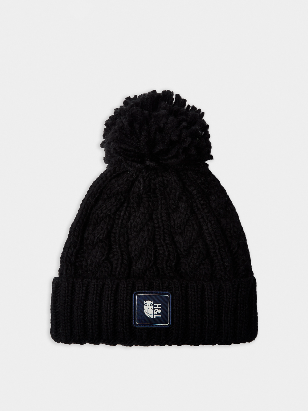 Made from 100% soft-touch acrylic, this heavyweight melange cable knit beanie provides a cosy, hand-knitted feel, making it an essential winter accessory.