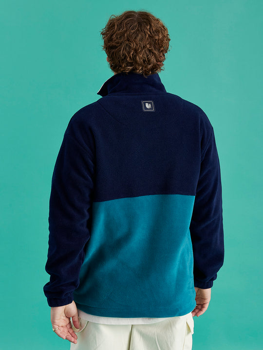 Quarter zip with Navy branded zip pull, with cream embroidered Harper & Lewis Logo, adding subtle details to warm fleece.
