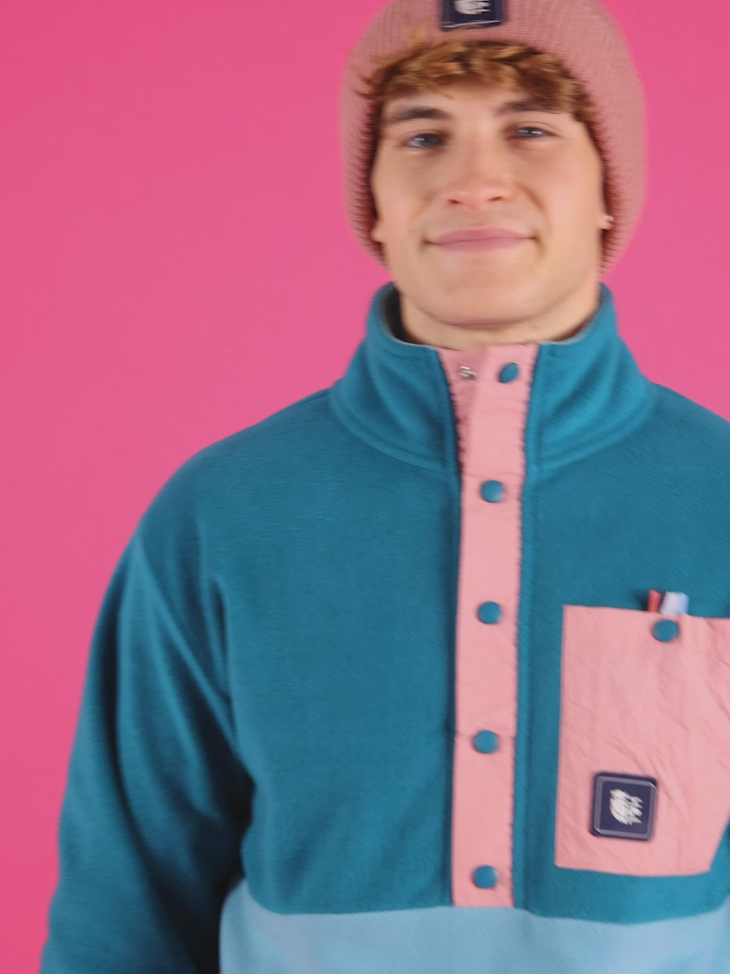 mens fleece with Dusty Pink crinkle woven button placket and pocket and along the buttoned neck.
